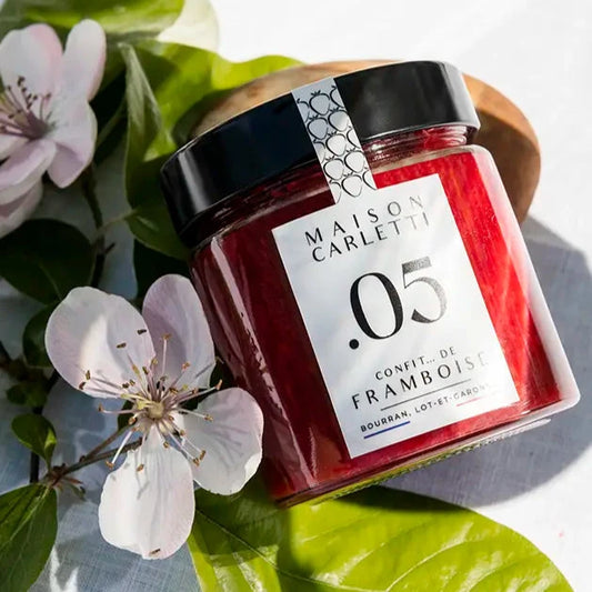 Pot de confit de framboise Maison Carletti avec étiquette visible